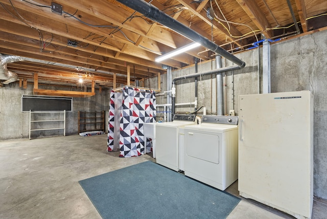 basement with washing machine and dryer