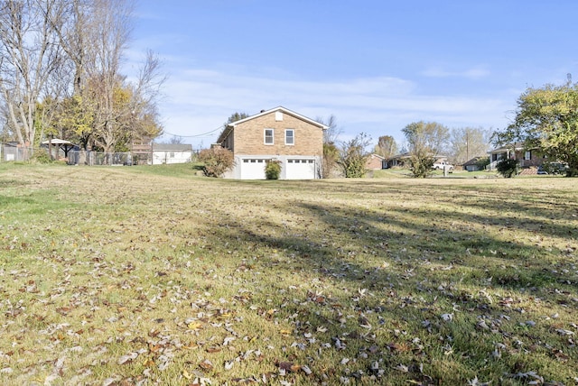 view of yard with a garage