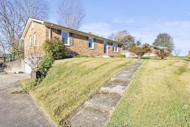 ranch-style home with a front yard