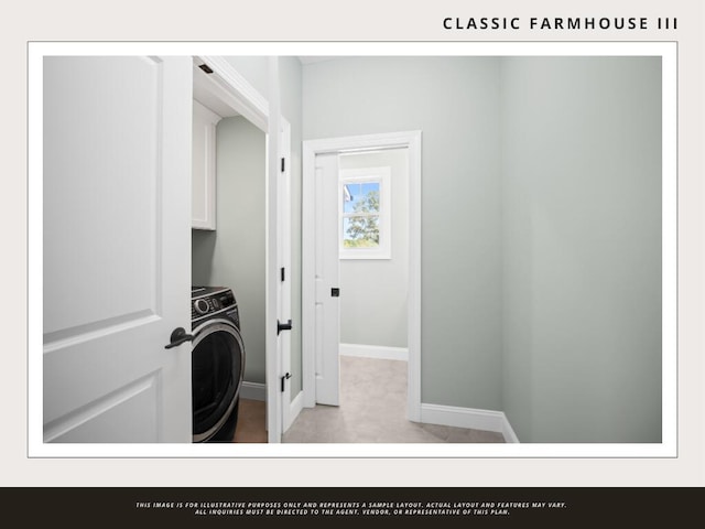 laundry area with cabinets and washer / dryer