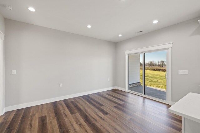 mudroom with baseboards, dark wood-style flooring, and recessed lighting