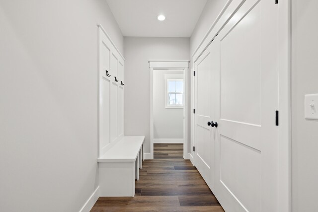 spare room with recessed lighting, dark wood-style floors, visible vents, crown molding, and baseboards