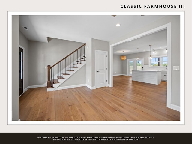 unfurnished living room with light wood-type flooring