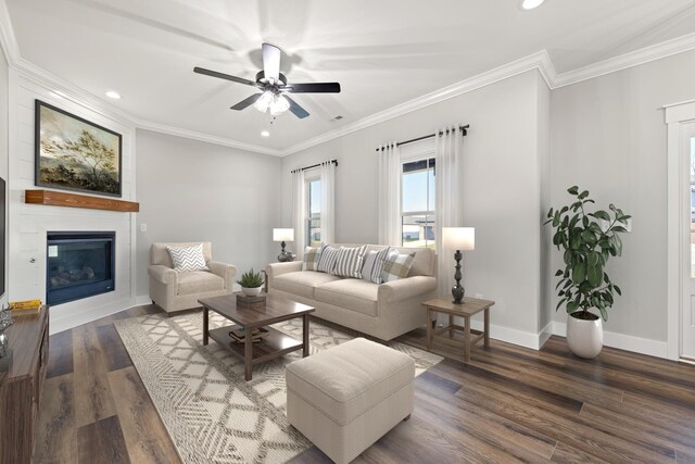 unfurnished living room with ceiling fan, dark wood-style flooring, a large fireplace, and recessed lighting