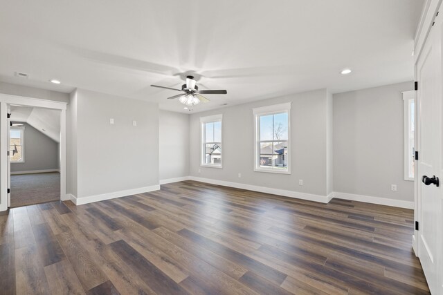 additional living space with baseboards, lofted ceiling, visible vents, and carpet floors