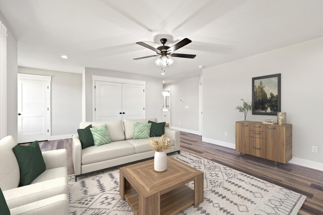 living area featuring wood finished floors, baseboards, recessed lighting, and ceiling fan