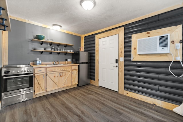 kitchen with a textured ceiling, light brown cabinets, stainless steel appliances, sink, and dark hardwood / wood-style floors