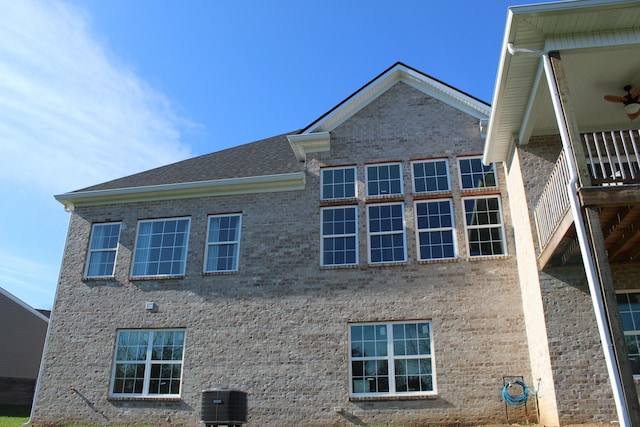 212 Patrum Sisters Way, Danville, KY 40422 - view of side of home featuring a ceiling fan, brick siding, and cooling unit