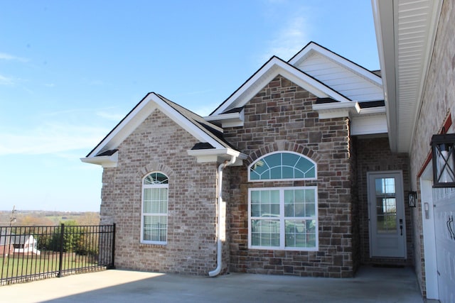 212 Patrum Sisters Way, Danville, KY 40422 - view of front of home with fence, brick siding, and stone siding