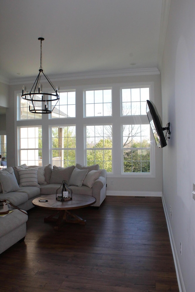 212 Patrum Sisters Way, Danville, KY 40422 - living room featuring baseboards, a chandelier, crown molding, and dark wood-type flooring
