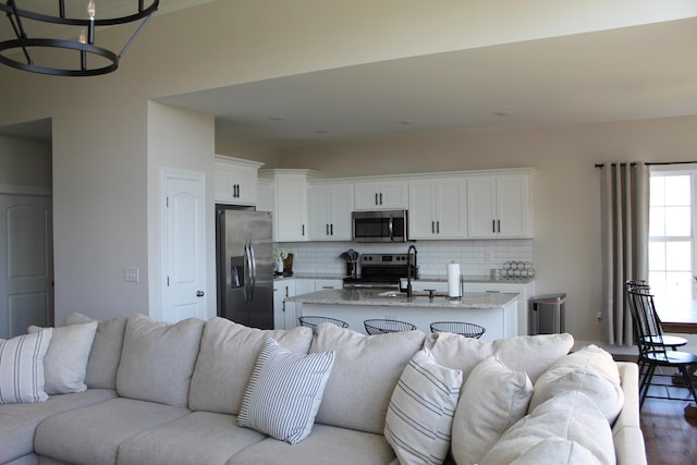 212 Patrum Sisters Way, Danville, KY 40422 - living area with a chandelier and light wood-type flooring