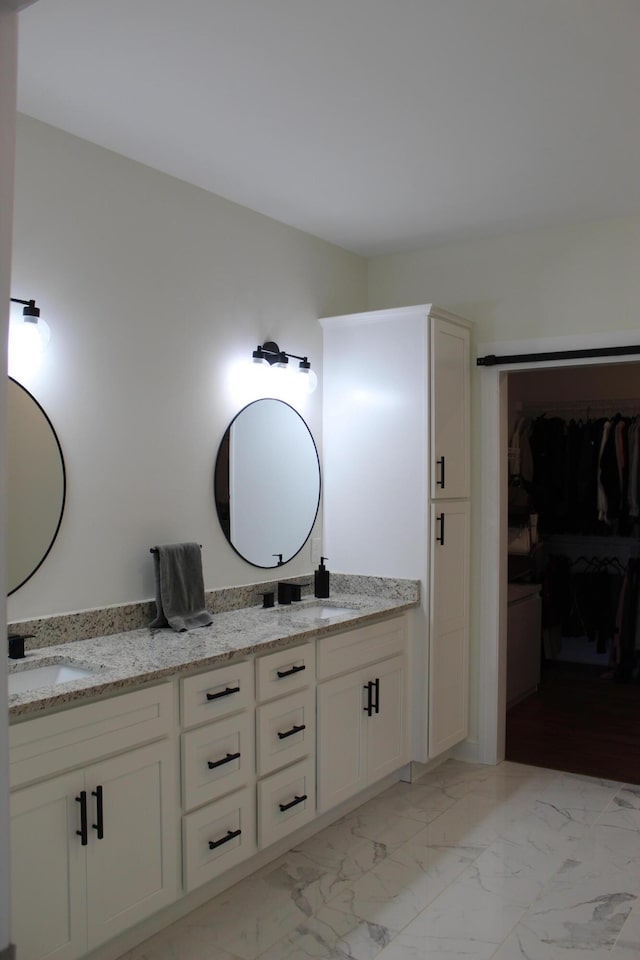 212 Patrum Sisters Way, Danville, KY 40422 - full bathroom featuring double vanity, a walk in closet, and marble look tiles