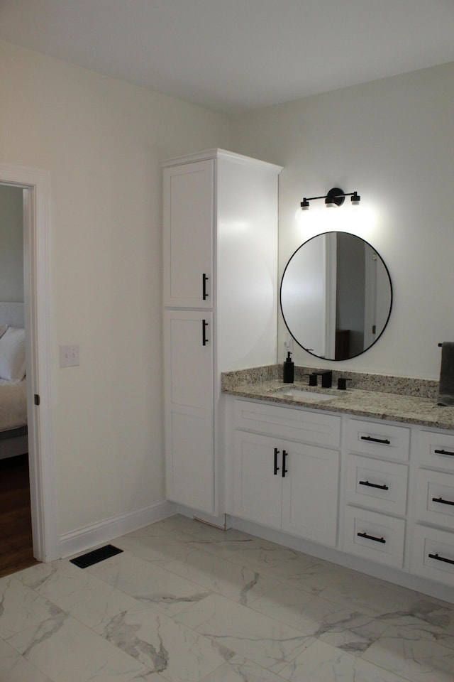 212 Patrum Sisters Way, Danville, KY 40422 - ensuite bathroom with vanity, marble finish floors, and baseboards