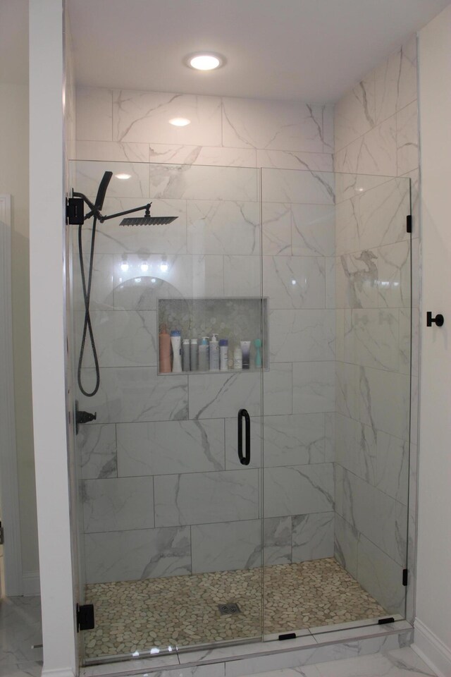 212 Patrum Sisters Way, Danville, KY 40422 - full bathroom featuring marble look tiles, a stall shower, and baseboards