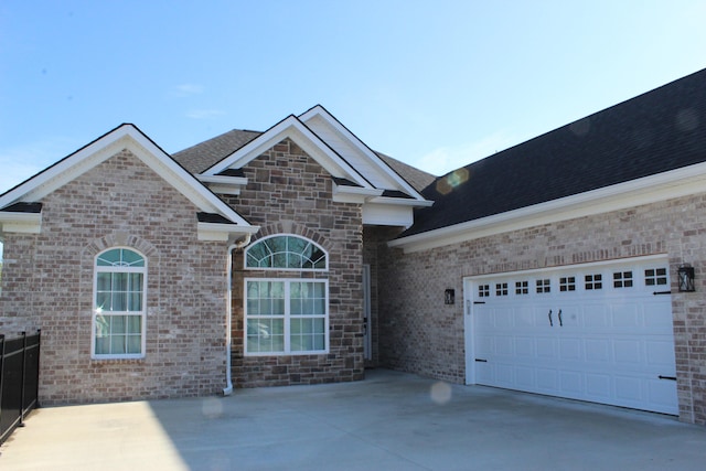 front of property with a garage