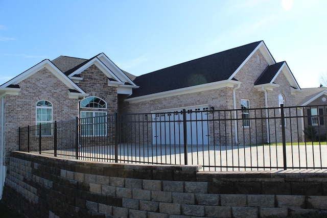 212 Patrum Sisters Way, Danville, KY 40422 - view of front of property featuring brick siding, a garage, and a shingled roof