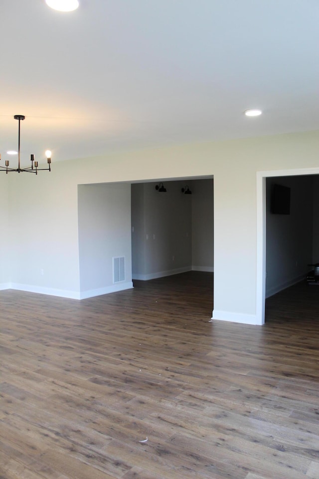 212 Patrum Sisters Way, Danville, KY 40422 - empty room with a chandelier, baseboards, wood finished floors, and recessed lighting