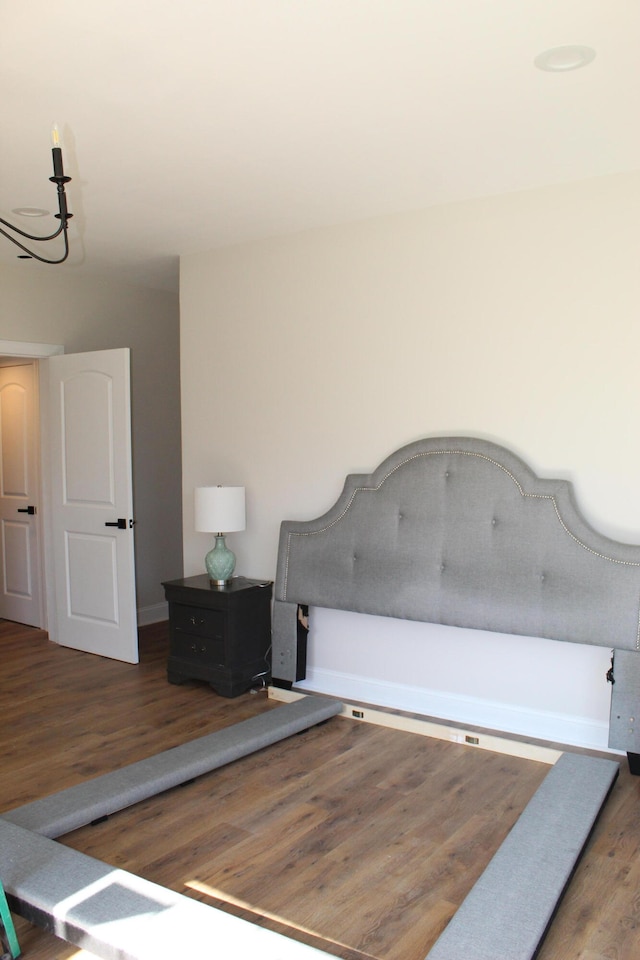 bedroom featuring dark hardwood / wood-style floors