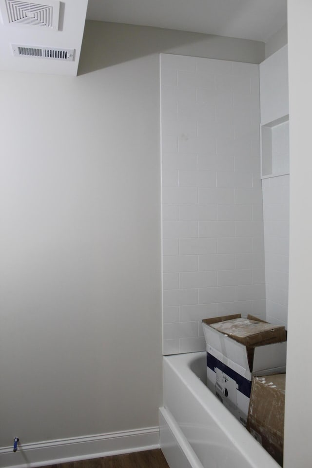 212 Patrum Sisters Way, Danville, KY 40422 - full bath featuring a bath, wood finished floors, and baseboards