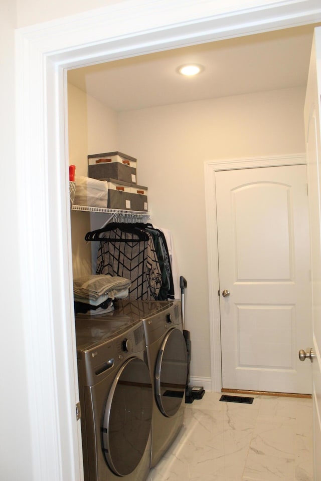 212 Patrum Sisters Way, Danville, KY 40422 - clothes washing area featuring washing machine and dryer, marble finish floors, and recessed lighting