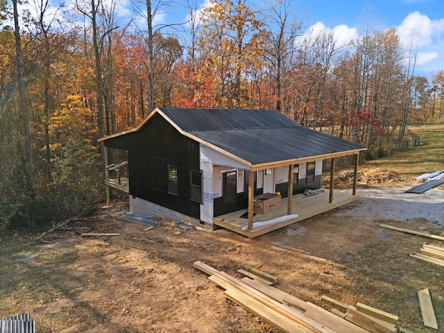 view of outbuilding featuring a porch