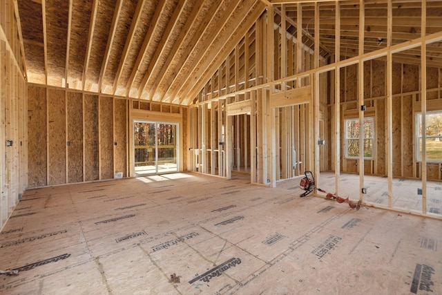 misc room with high vaulted ceiling