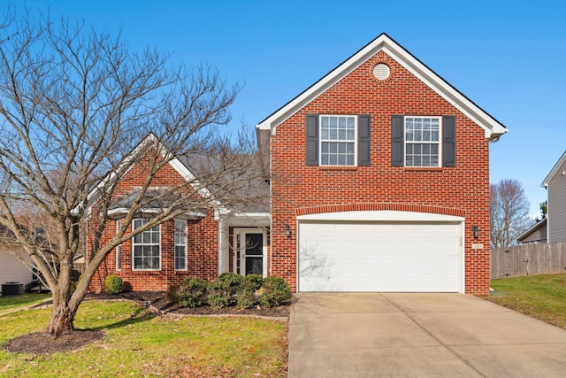 traditional-style house featuring brick siding, a front lawn, fence, a garage, and driveway