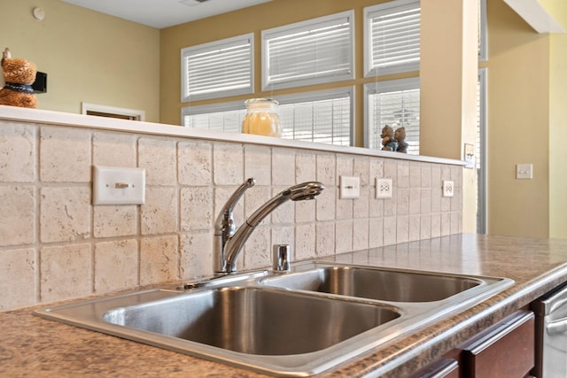 details with backsplash and a sink