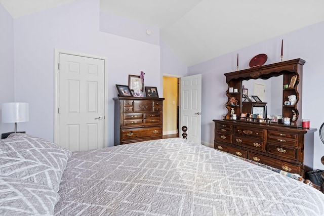 bedroom featuring vaulted ceiling