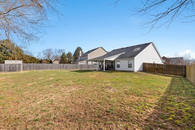 view of yard featuring a fenced backyard