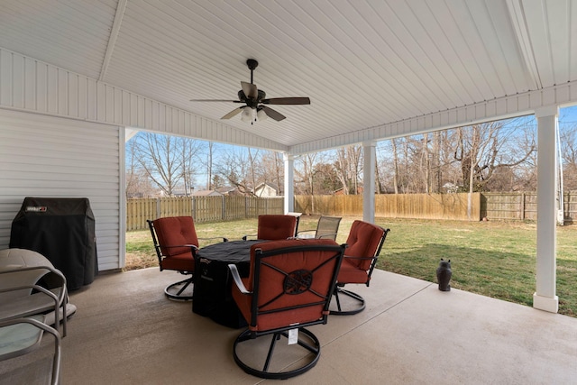 view of patio / terrace featuring a fenced backyard, outdoor dining space, a ceiling fan, and grilling area