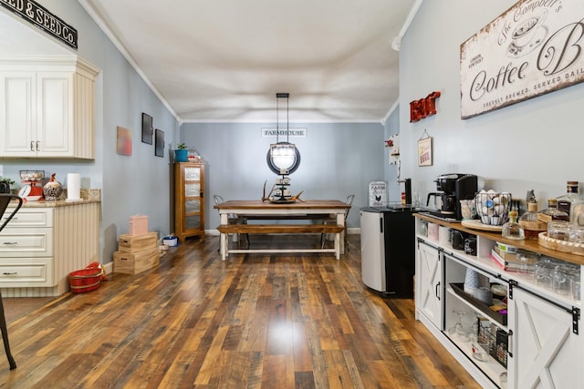 interior space with dark wood-type flooring and crown molding