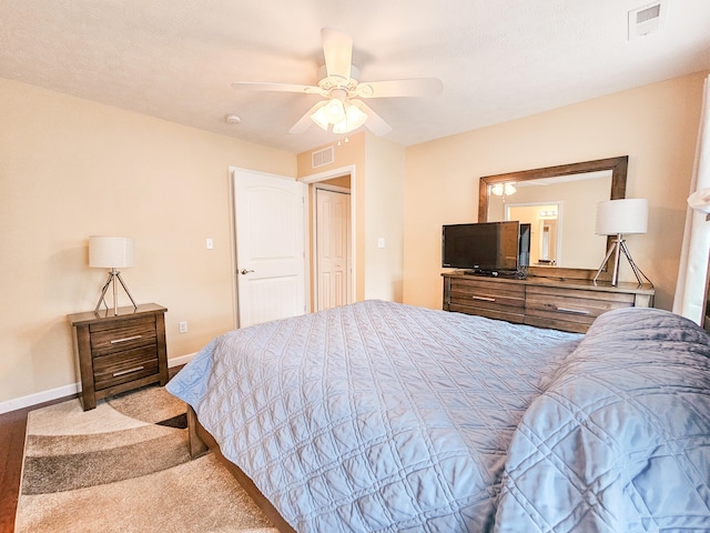 bedroom featuring ceiling fan and carpet floors