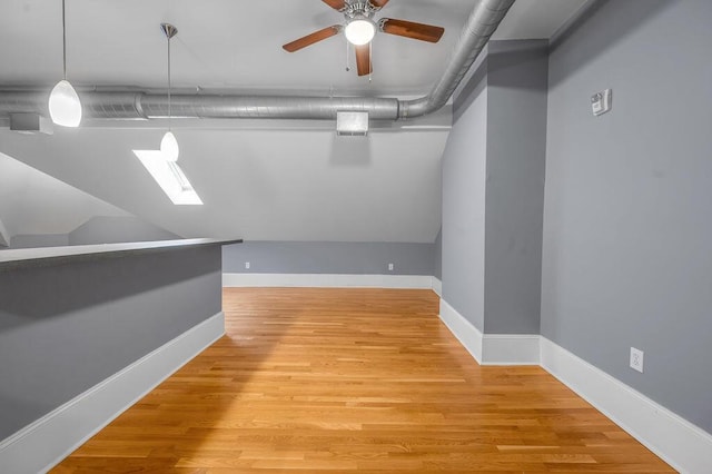 interior space with light hardwood / wood-style flooring and ceiling fan