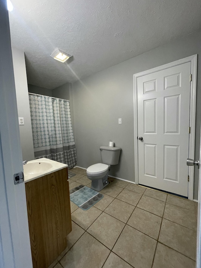 1455 Nepton Rd, Ewing, KY 41039 - full bathroom with tile patterned floors, toilet, vanity, a textured ceiling, and a shower with curtain