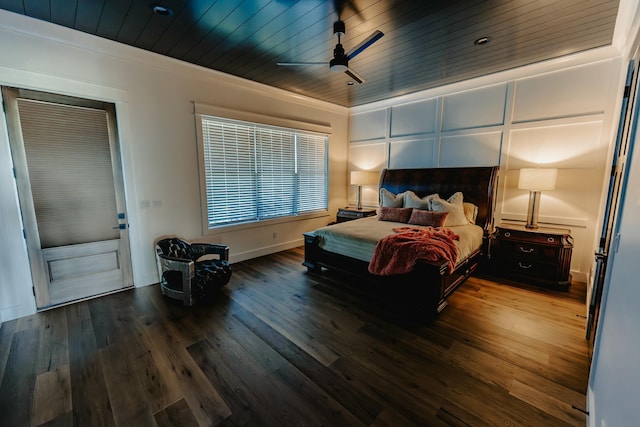 bedroom with wood-type flooring, ornamental molding, ceiling fan, and wooden ceiling