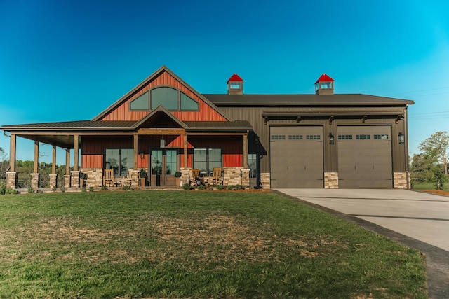 view of front facade with a garage and a front lawn