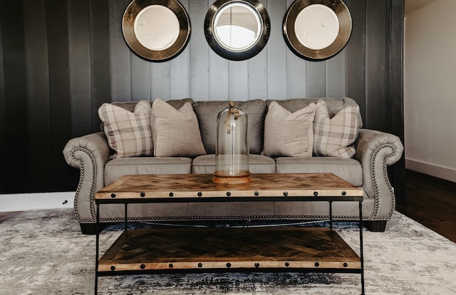 living room with dark hardwood / wood-style flooring