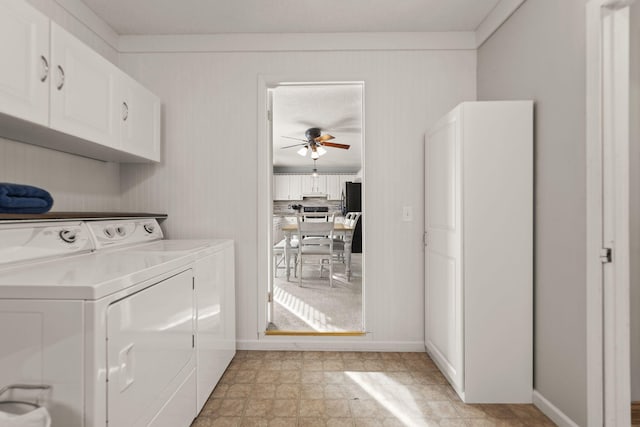 clothes washing area with washer and clothes dryer, cabinets, and ceiling fan