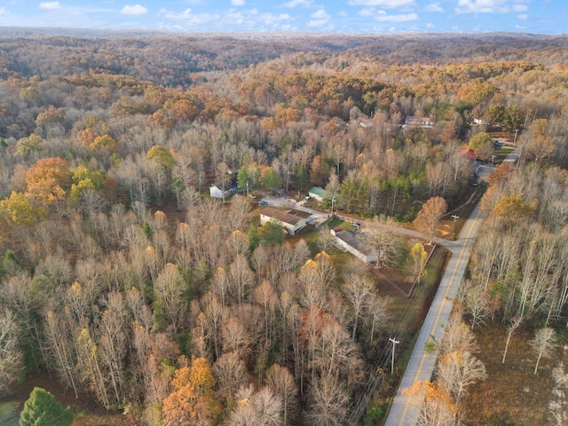 single story home featuring a front lawn and a patio