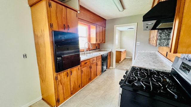 kitchen featuring sink, black appliances, and exhaust hood