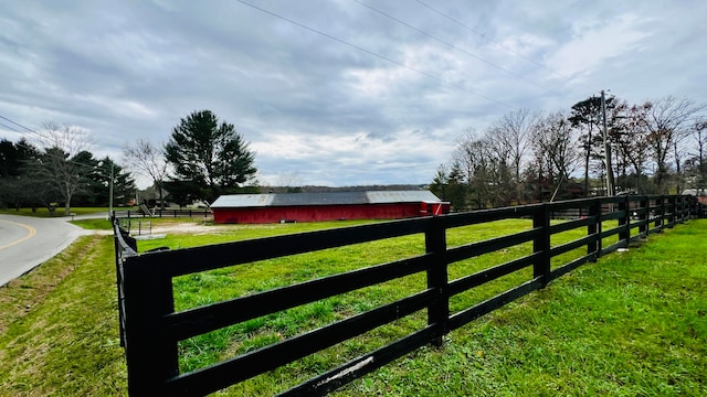 view of gate featuring a lawn