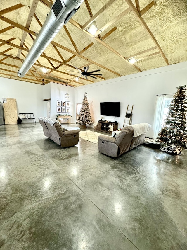 living area with concrete flooring