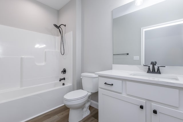 full bathroom with wood-type flooring, vanity, toilet, and shower / tub combination