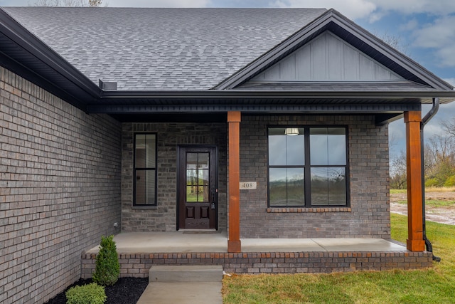 entrance to property with a porch