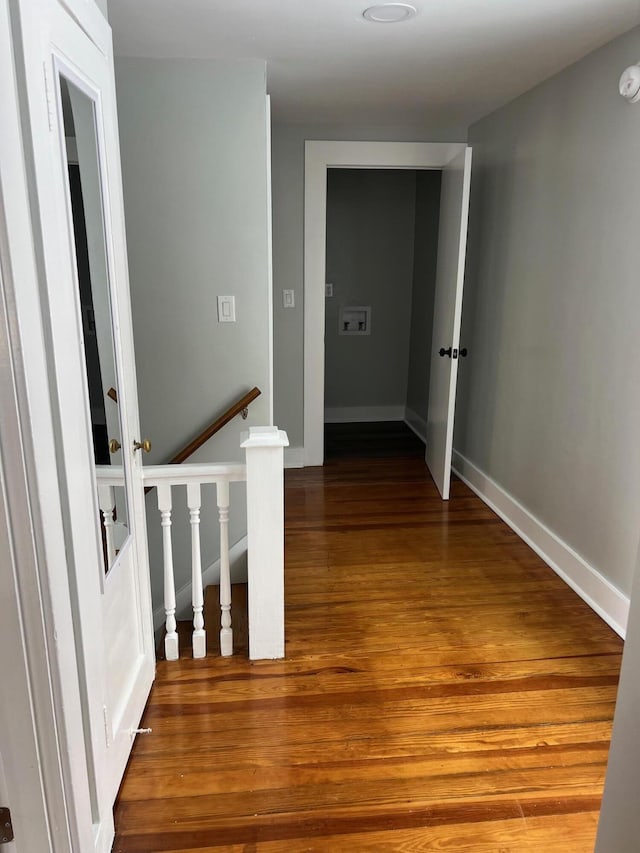 hallway featuring hardwood / wood-style flooring