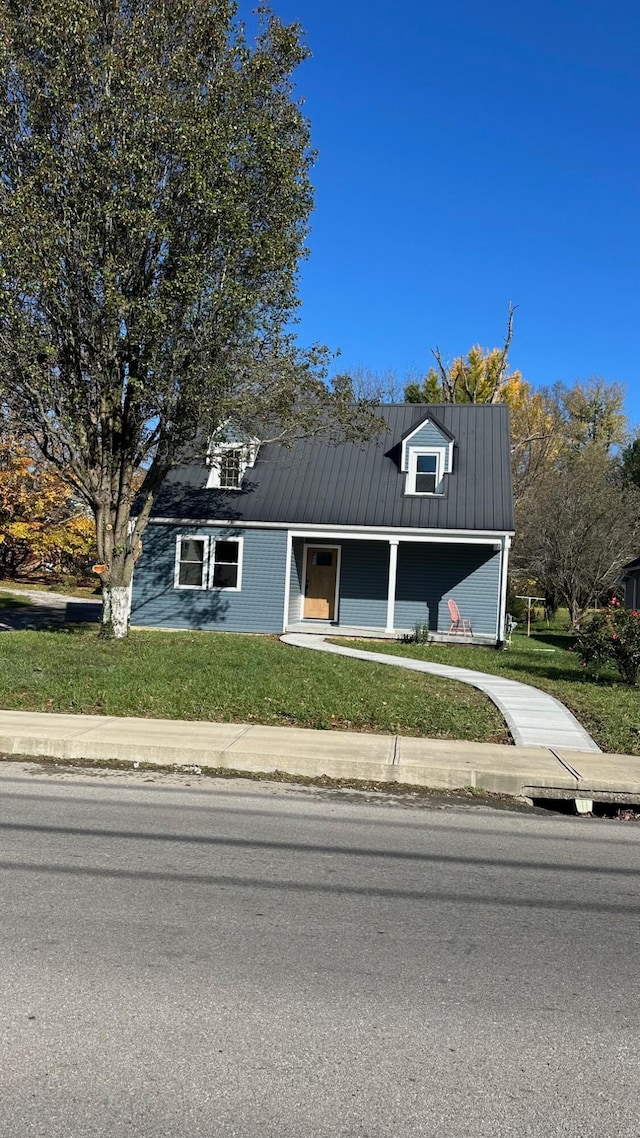 view of front of property with a front lawn