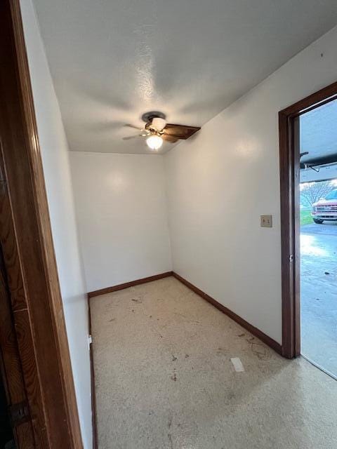 empty room with carpet and ceiling fan