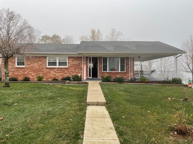 view of front of property with a front lawn