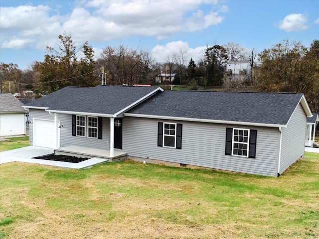 ranch-style house with a front lawn and a garage